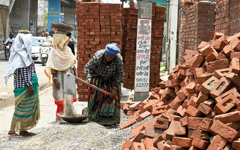 Indian street scene bricks - Credit: Getty - 2159700657